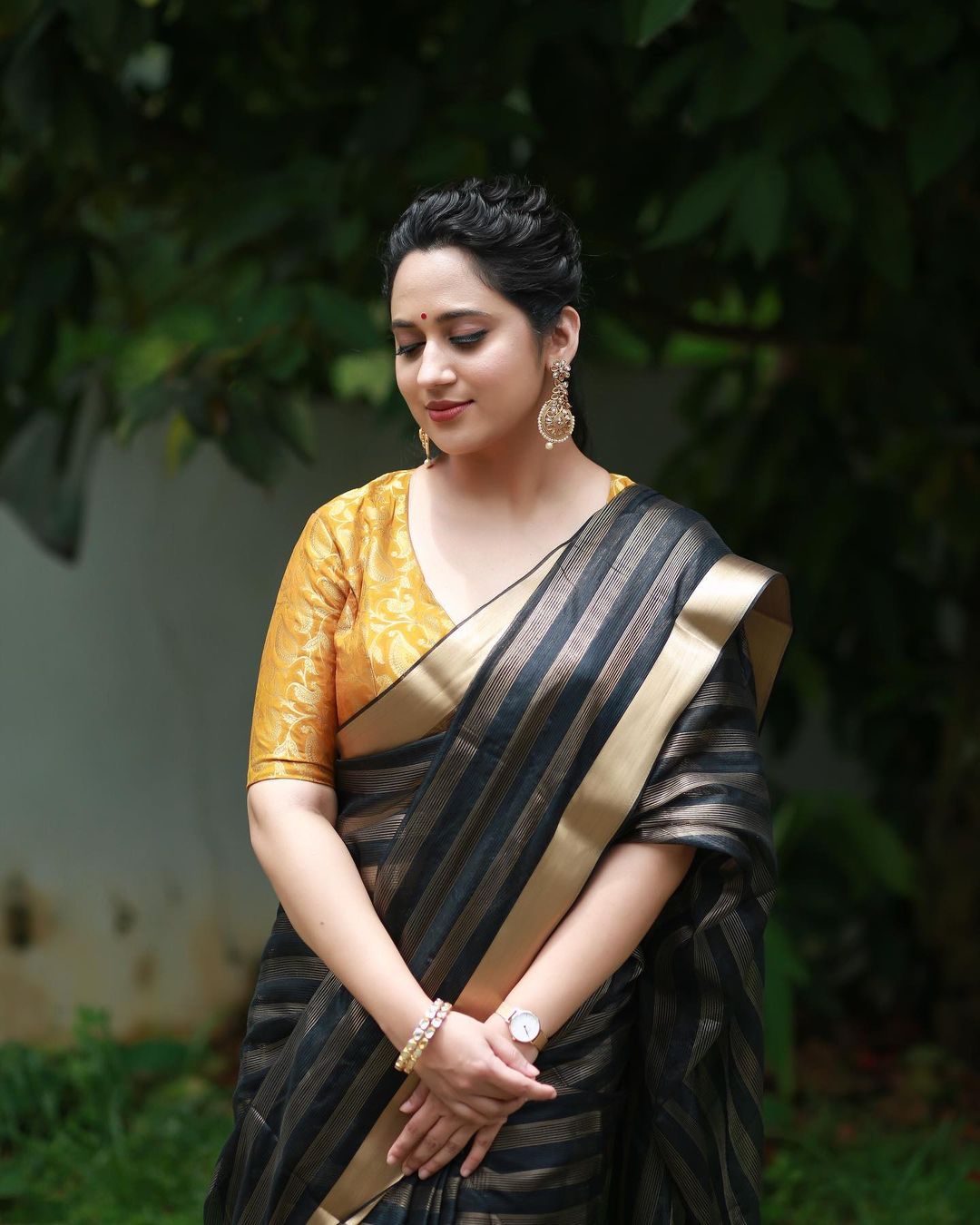 Malayalam Actress Miya George Stills in Black Saree Yellow Blouse